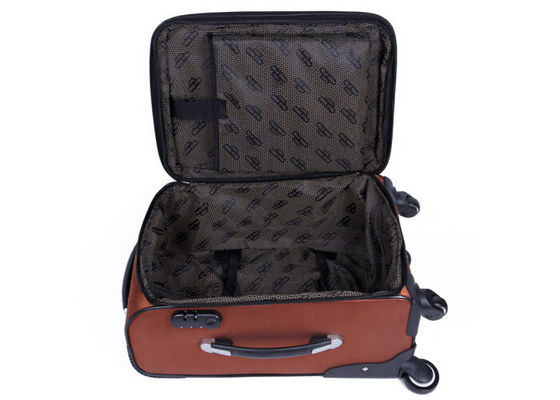 O nylon e mala de viagem de couro do plutônio a grande no trole das rodas encaixotam a bagagem para o curso, esportes